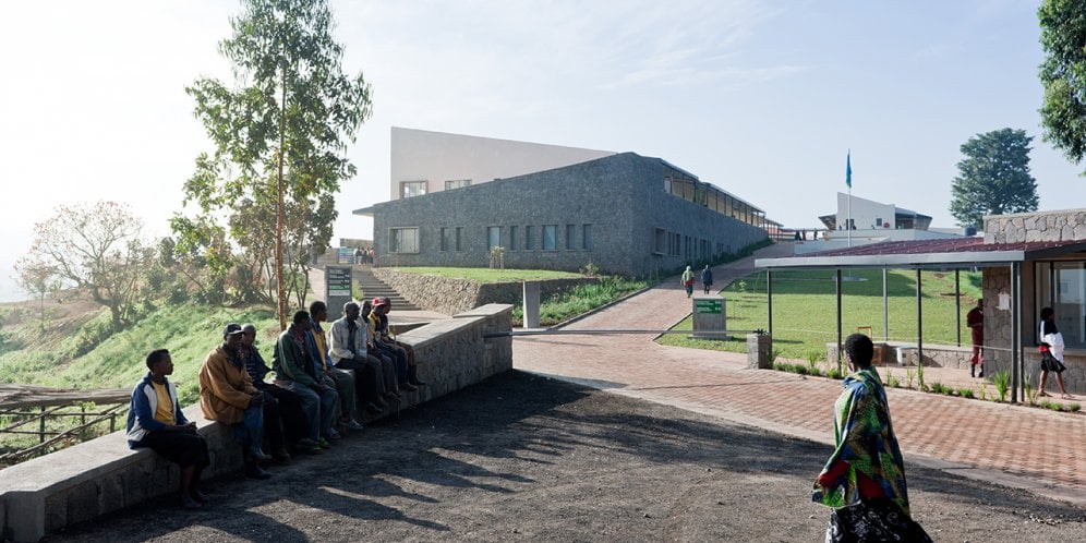 Photo of the Butaro District Hospital,  Photo by Iwan Baan, Front Entrance with Community Members