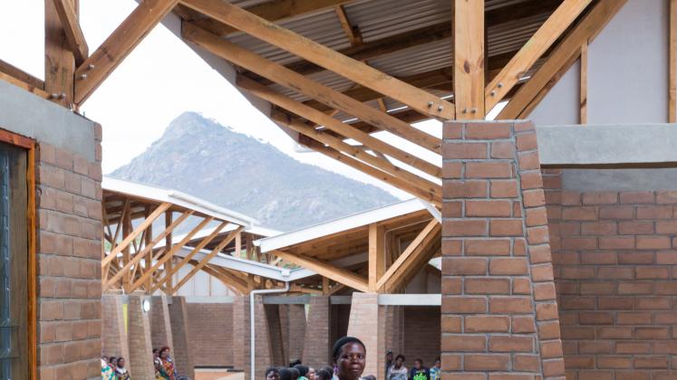 Photo of Maternity Waiting Village, Photo by Iwan Baan, Mothers site with each other