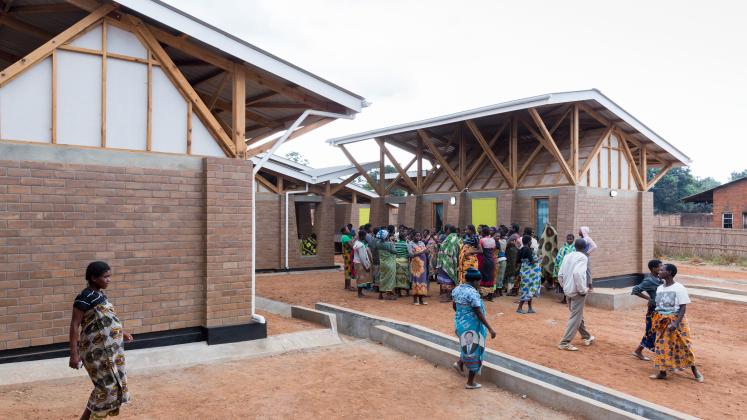 Photo of Maternity Waiting Village, Photo by Iwan Baan, expectant mothers Gather in a Courtyard