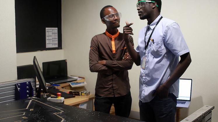 Photo: ADC Fellows in the FAB LAB fabricating a chair during an Autodesk workshop