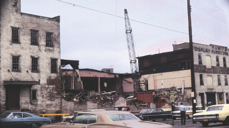 The demolition of the Kowtiz Furniture Store building at 3rd and Riverside Drive to make way for the Riverside Drive Development.