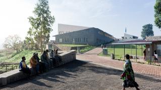 Photo of the Butaro District Hospital,  Photo by Iwan Baan, Front Entrance with Community Members